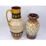 WEST GERMAN MARKED STUDIO POTTERY VASES, one with handle, 34cms H and 27cms H measurements