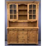 REPRODUCTION PINE GLASS TOP DRESSER having twin upper glazed doors and central shelving over a