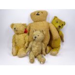 FOUR VINTAGE TEDDY BEARS including mohair with jointed limbs, the small example with interior squeak