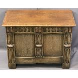 TEEANGEE REPRODUCTION OAK MINIATURE COFFER having a lidded top with moulded edging and carving to