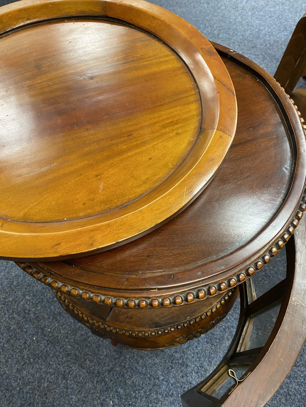 REPRODUCTION HARDWOOD DRUM TYPE DRINKS CABINET having a lift-off circular tray top, beaded and - Image 3 of 4