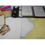 VINTAGE OS MAPS, marine charts with a quantity of foreign banknotes and coin currency