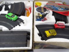 BOXED SCALEXTRIC SETS (2) including Beetle Cup and Scalextric 300 Mini Clubman Raleigh Cross set,