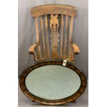 ANTIQUE FARMHOUSE ARMCHAIR and a vintage oval wall mirror, the chair high back with curved top