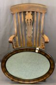 ANTIQUE FARMHOUSE ARMCHAIR and a vintage oval wall mirror, the chair high back with curved top