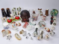 COLLECTABLE CABINET FIGURINES, animals and ornaments including a Black Boy tobacco jar, miniature