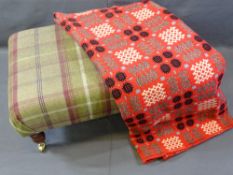 VINTAGE WELSH WOOLLEN BLANKET and a modern tartan covered footstool on brass castors, the blanket