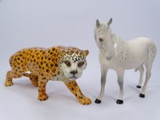 BESWICK JAGUAR, 29cms long and a Royal Doulton Dappled Grey Horse, 18cms H