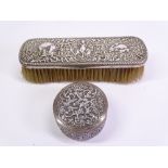 INDIAN BHUJ SILVER DRESSING TABLE BRUSH and similar circular lidded box, the brush stamped 'O M