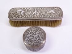 INDIAN BHUJ SILVER DRESSING TABLE BRUSH and similar circular lidded box, the brush stamped 'O M