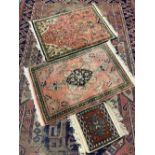 ANTIQUE & LATER EASTERN RUGS including a 210 x 144cms blue and red ground example, traditionally