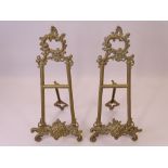 ROCOCO STYLE BRASS TABLETOP EASELS, A PAIR, 31cms H