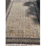 INDIAN STYLE WOOLLEN RUG with tasselled ends, 295 x 198cms