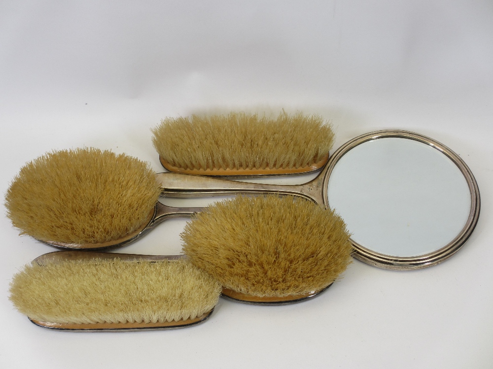 SILVER DRESSING TABLE SET, five pieces to include four brushes and a mirror, Sheffield 1946/7, a - Image 2 of 2