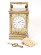 MAPPIN & WEBB CARRIAGE CLOCK, Roman numerals on an enamel dial and fretwork ground of leafy scrolls,