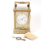 MAPPIN & WEBB CARRIAGE CLOCK, Roman numerals on an enamel dial and fretwork ground of leafy scrolls,