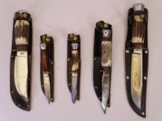 MODERN BOWIE TYPE COLLECTOR'S KNIVES (5), all similarly styled with leather sheaths, four being horn