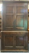 19th CENTURY CORNER CUPBOARD - two piece, having two upper and two lower doors all with fielded