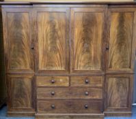 TRIPLE WARDROBE WITH BREAKFRONT, late Victorian mahogany, labelled 'M Wilson, Great Queen St',