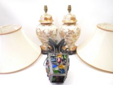 FANCY CHINESE TABLE LAMPS on hardwood stands, 42cms and a cast iron ceiling lamp