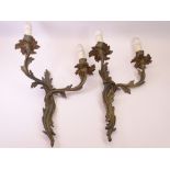 LIGHTING - a pair of metallic wall mountable two-branch light fittings