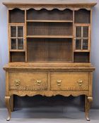 SHROPSHIRE OAK DRESSER - Early 20th century having a moulded cornice and shaped frieze over an