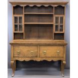 SHROPSHIRE OAK DRESSER - Early 20th century having a moulded cornice and shaped frieze over an