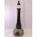 A CORNISH LIGHTHOUSE SHAPED TABLE LAMP, 60cms tall (replaced glass)