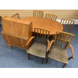 MID-CENTURY TEAK DINING SUITE of extending dining table with fold-out leaf, 76cms H, 151.5cms L,