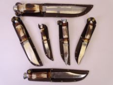 MODERN BOWIE TYPE COLLECTOR'S KNIVES (6) all similarly styled with horn handles in brown leather