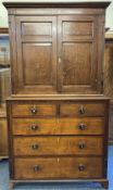 19th CENTURY OAK PRESS CUPBOARD, two piece, having a two door, three shelved upper section over a