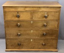 19th CENTURY OAK CHEST of two over three long drawers and secret upper drawer with turned knobs, 102