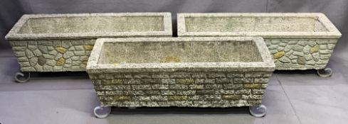 GARDEN PLANTERS - 3 oblong reconstituted stone on metal scroll feet, 24cms H, 70cms W, 26cms D (