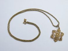 VICTORIAN 15CT GOLD & SEED PEARL OPEN FLORAL WORK PENDANT on a 9ct gold twist link necklace, 3.