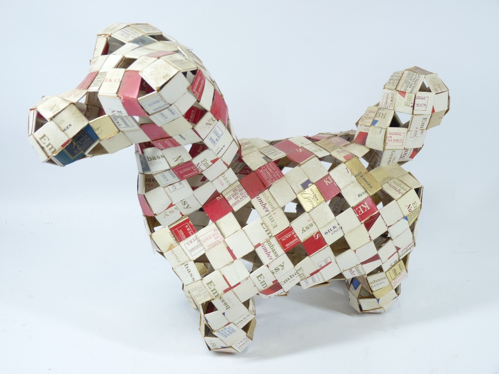 DOG SCULPTURE made from vintage cigarette packets, 40cms L