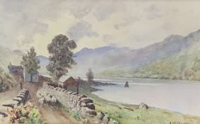 J W CLAYTON watercolour - Crafnant Lake with figure on a track with sheep and boat on the lake,