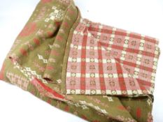 WELSH BLANKET - green ground with red, pink and white patterning, approx 210 x 70cms