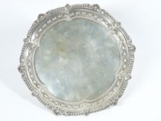 CIRCULAR CALLING CARD TRAY with raised detail to the rim, London 1906, maker Mappin & Webb Ltd, 5.