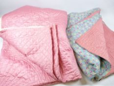 TWO PINK SILK EFFECT THROWS - 1. Blue ground with small floral squares and pink back, approx 210 x