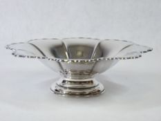 A SILVER PEDESTAL BOWL WITH BUTTERFLY RIM - 13ozs, Sheffield 1944, 25cms diameter, 7cms H