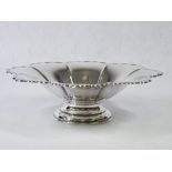 A SILVER PEDESTAL BOWL WITH BUTTERFLY RIM - 13ozs, Sheffield 1944, 25cms diameter, 7cms H