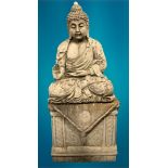 GARDEN STONEWARE - reconstituted statuary depicting a seated Buddhist figurine on a rectangular