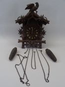 BLACK FOREST TYPE WALL HANGING CUCKOO CLOCK - with cone chain weights, 34cms H