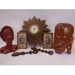 VINTAGE STARBURST WALLCLOCK, carved heads, modern love spoons and two needlework images of clipper