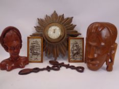 VINTAGE STARBURST WALLCLOCK, carved heads, modern love spoons and two needlework images of clipper