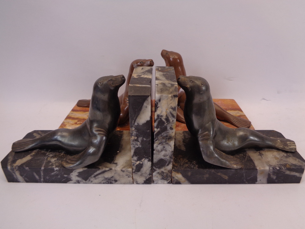 FRENCH CAST BRONZE & MARBLE BOOKENDS, TWO PAIRS - depicted as Sea Lions on black and pink marble - Image 2 of 2