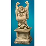 GARDEN STONEWARE - reconstituted statuary depicting a laughing Buddha hands aloft standing on a