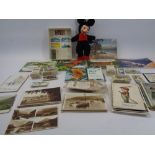 VINTAGE POSTCARDS, CIGARETTE CARDS, TEA CARDS with a small cloth figure of Mickey Mouse