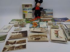 VINTAGE POSTCARDS, CIGARETTE CARDS, TEA CARDS with a small cloth figure of Mickey Mouse