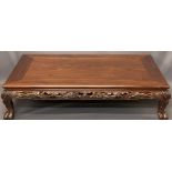 20TH CENTURY CHINESE HARDWOOD OVERSIZE COFFEE TABLE - lower carved frieze detail and mask corners on